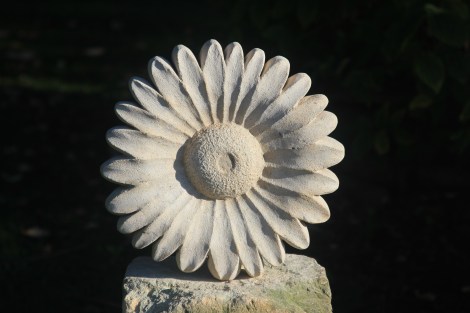 Sculpture of flower / daisy carved in Bath limestone