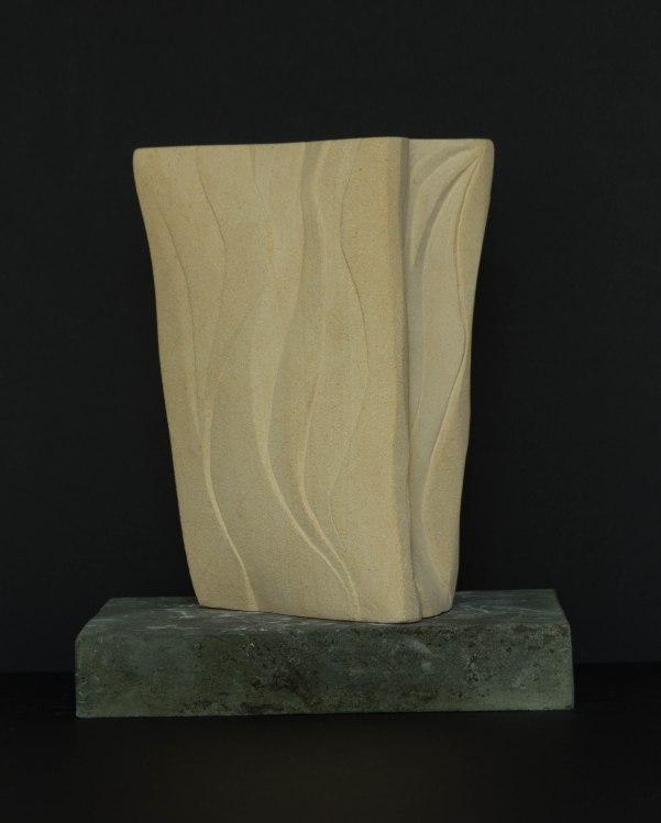 Distorted organic form carved in Caen limestone