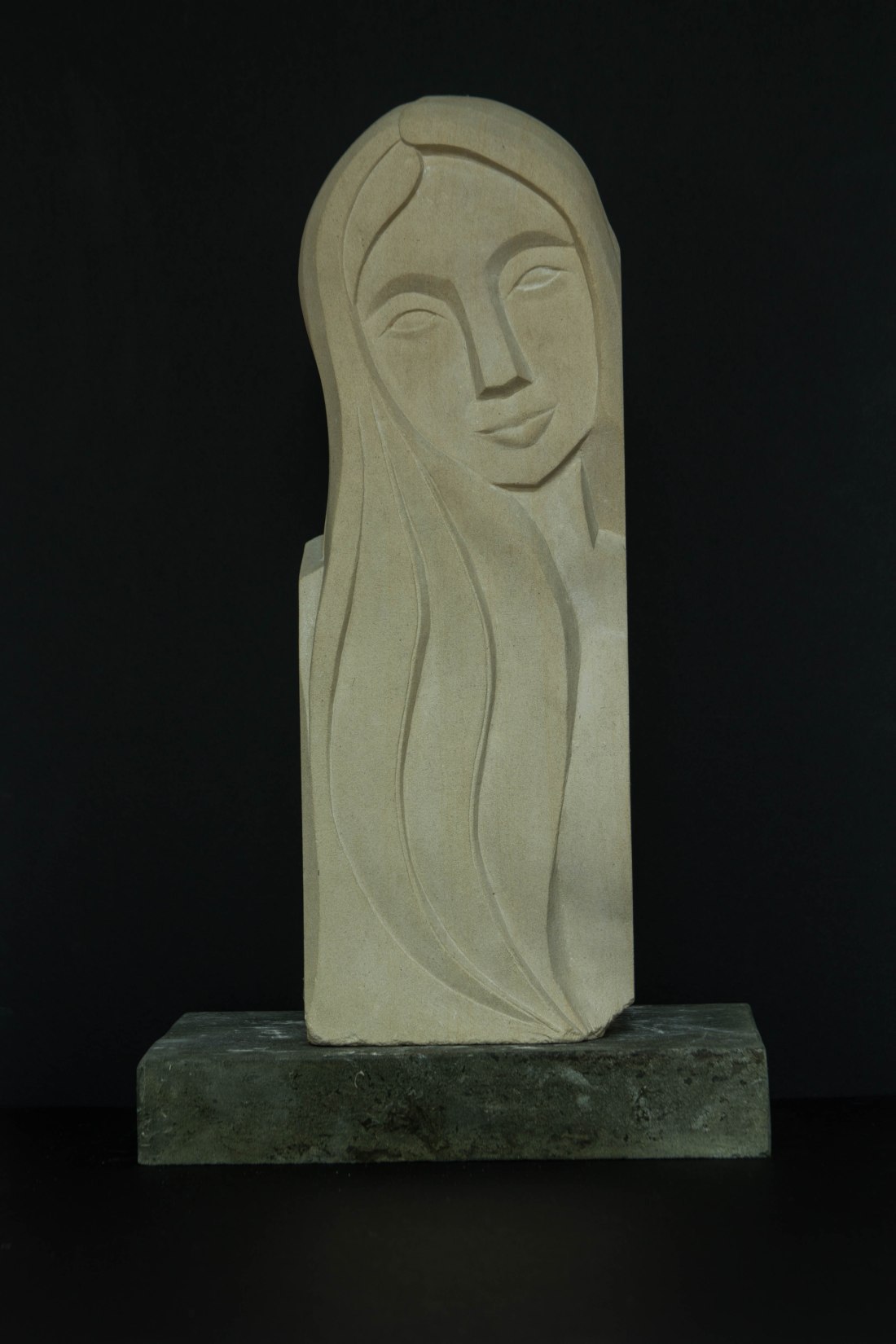 Dreaming face sculpture: carved in Caen limestone