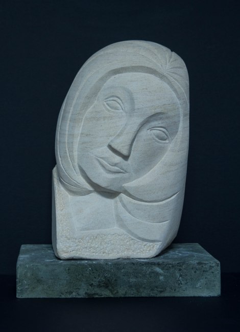 face sculpture: carving in French limestone