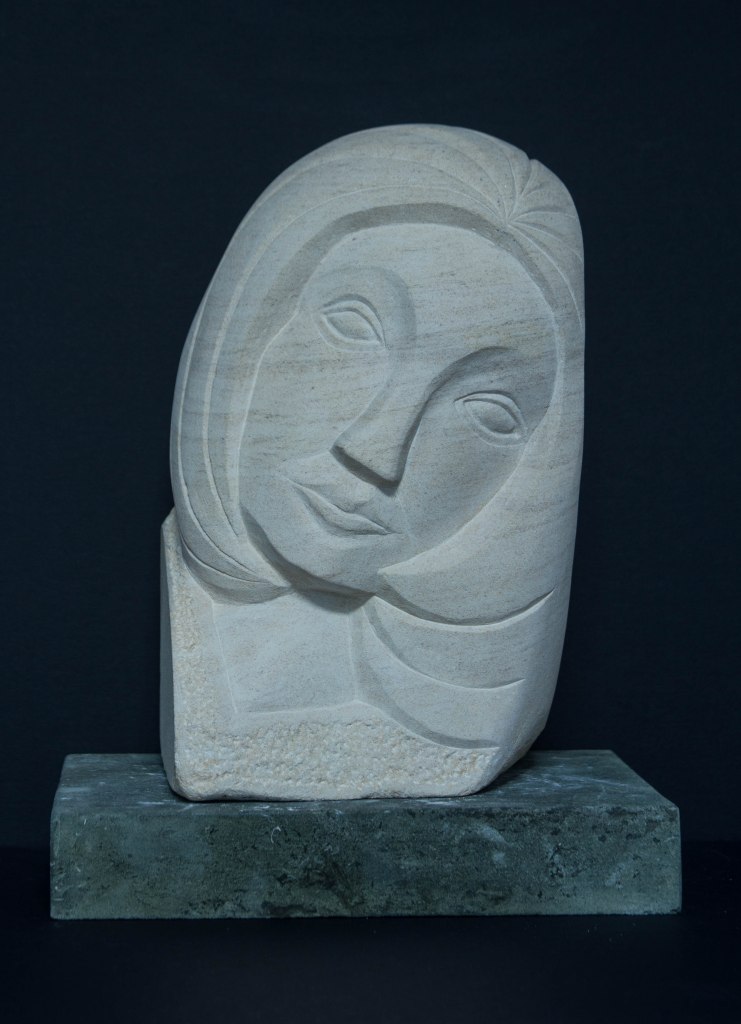 face sculpture: carving in French limestone