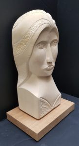 Caen limestone on a green English oak base